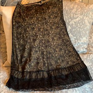 Beautiful black lace skirt with cream slip.